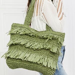 The Last Straw Fringe Straw Tote Bag. In Olive
